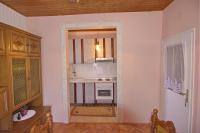 Kuchyňa alebo kuchynka v ubytovaní Apartment and Rooms Toka