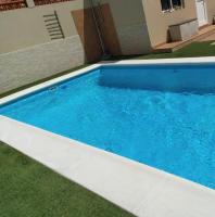 Bazén v ubytovaní Mar&Mar, apartamento con solárium y piscina alebo v jeho blízkosti