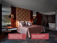 a poster of a bedroom with a bed in a room at Theatre Hotel in Olomouc