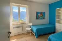 Postel nebo postele na pokoji v ubytování Wohnung mit grandioser Aussicht am Wasserfall