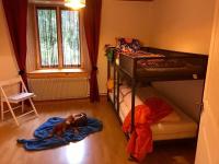 Palanda nebo palandy na pokoji v ubytování Ferienwohnung Hof unterer Dürrenberg Langenbruck