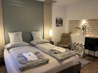 Posteľ alebo postele v izbe v ubytovaní AMADEA - Cityhotel Salzburg