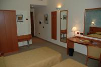 A bed or beds in a room at Hotel Brindor