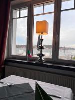 Кровать или кровати в номере MiLANO Seehotel