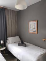 Postel nebo postele na pokoji v ubytování Apartamento Victoria