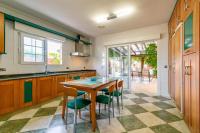 A kitchen or kitchenette at Elegant Villa in Playa Honda with Private Pool