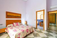A bed or beds in a room at Elegant Villa in Playa Honda with Private Pool