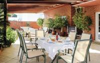 A restaurant or other place to eat at Elegant Villa in Playa Honda with Private Pool