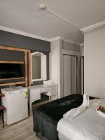 Postel nebo postele na pokoji v ubytování Yilmazel Hotel