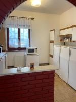 Kuchyň nebo kuchyňský kout v ubytování Gold Apartman