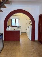 Kuchyň nebo kuchyňský kout v ubytování Gold Apartman