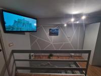 Televízia a/alebo spoločenská miestnosť v ubytovaní La Casa di Rocco