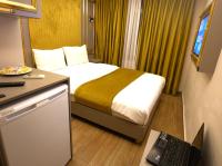 Postel nebo postele na pokoji v ubytování Taksim La Marino Hotel