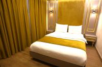 Postel nebo postele na pokoji v ubytování Taksim La Marino Hotel
