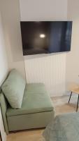 Televízia a/alebo spoločenská miestnosť v ubytovaní 120 w 5 gwiazdowym ROYAL TULIP SAND 200 m od plaży DOBRUK APARTAMENTY