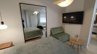Televízia a/alebo spoločenská miestnosť v ubytovaní 120 w 5 gwiazdowym ROYAL TULIP SAND 200 m od plaży DOBRUK APARTAMENTY