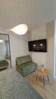 Televízia a/alebo spoločenská miestnosť v ubytovaní 120 w 5 gwiazdowym ROYAL TULIP SAND 200 m od plaży DOBRUK APARTAMENTY