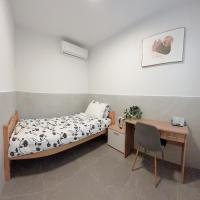 Postel nebo postele na pokoji v ubytování Lina Rooms Hostel