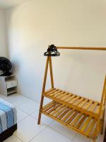 Pousada hostel praia itapuaにあるベッド