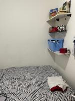 Pousada hostel praia itapuaにあるベッド