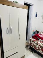 Pousada hostel praia itapuaにあるベッド