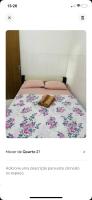 Pousada hostel praia itapuaにあるベッド