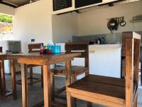 Kuchyň nebo kuchyňský kout v ubytování Sunny Bungalows Areguling