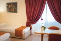 Łóżko lub łóżka w pokoju w obiekcie Best Western Mirage Hotel Fiera