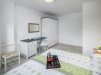 Posteľ alebo postele v izbe v ubytovaní Apartments Aida