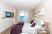 Postel nebo postele na pokoji v ubytování Hotel Brisa Marina