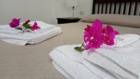 Posteľ alebo postele v izbe v ubytovaní Holiday Home Tarinuzza