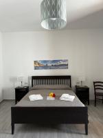 Posteľ alebo postele v izbe v ubytovaní Holiday Home Tarinuzza