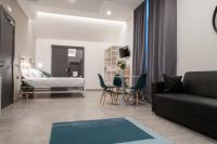 Posteľ alebo postele v izbe v ubytovaní Residence Hotel Moderno