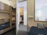 Łóżko lub łóżka w pokoju w obiekcie Studio calme rénové, balcon, Wifi, parking inclus, proche Transarc et commerces - FR-1-346-345