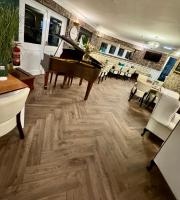 Predel za sedenje v nastanitvi The Old Stone Trough Country Hotel