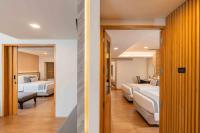 Ein Bett oder Betten in einem Zimmer der Unterkunft Phuket Graceland Resort and Spa