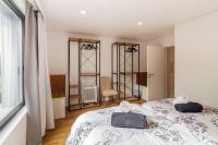 Postel nebo postele na pokoji v ubytování Your Azorean Home RRAL 3378