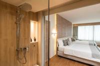 Ein Bett oder Betten in einem Zimmer der Unterkunft Phuket Graceland Resort and Spa