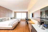 Ein Bett oder Betten in einem Zimmer der Unterkunft Phuket Graceland Resort and Spa