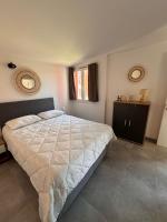 Posteľ alebo postele v izbe v ubytovaní Résidence hôtelière les hameaux de saint cyprien appartement 2 chambres