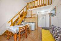 Kuchyň nebo kuchyňský kout v ubytování Apartments Mijic