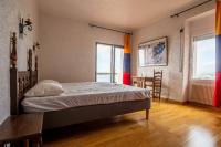 Postel nebo postele na pokoji v ubytování Villa Alco en Roses con vistas preciosas del mar AV-68