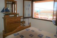 Posteľ alebo postele v izbe v ubytovaní Precioso apartamento con vistas en Roses AV-41