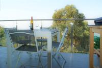 Balkón nebo terasa v ubytování Apartamento con vistas al mar y al puerto de Roses AV-07