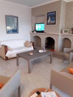 TV a/nebo společenská místnost v ubytování Apartamento Casa Linda con vistas espectaculares AV-40