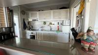 Kuchyň nebo kuchyňský kout v ubytování Apartamento Casa Linda con vistas espectaculares AV-40