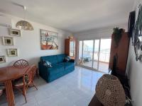 Posezení v ubytování Bonito apartamento con vistas al mar y piscina AV-47