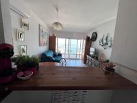 Posezení v ubytování Bonito apartamento con vistas al mar y piscina AV-47
