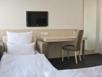 Postel nebo postele na pokoji v ubytování Viva Hotel Lübeck