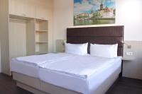 Postel nebo postele na pokoji v ubytování Viva Hotel Lübeck